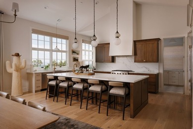 Architecturally stunning and built for entertaining, this rare - photo 10
