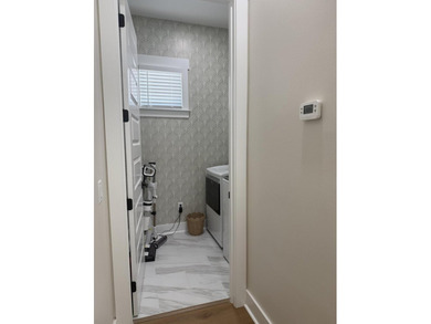 Construction complete and move-in ready! This home is less than - photo 32