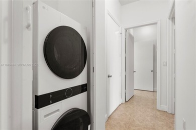 Live the Aventura lifestyle in this elegant 3-bedroom, 3-bath