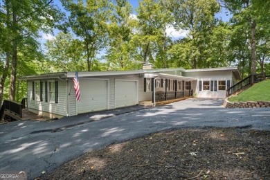 Lake Home For Sale in Flowery Branch, Georgia