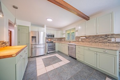 Nestled on over two acres in peaceful Grass Lake, this - photo 16