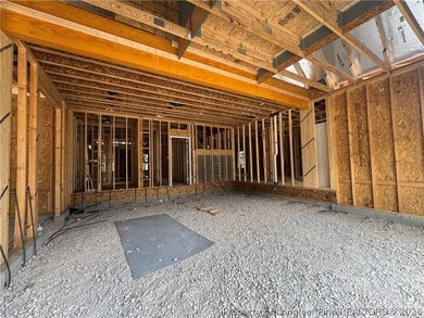 The RIVERMIST plan offers a two-story home opens to a foyer that - photo 2