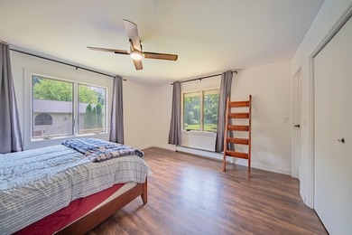 Nestled on over two acres in peaceful Grass Lake, this - photo 22