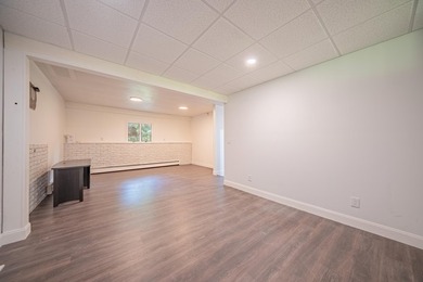 Nestled on over two acres in peaceful Grass Lake, this - photo 41