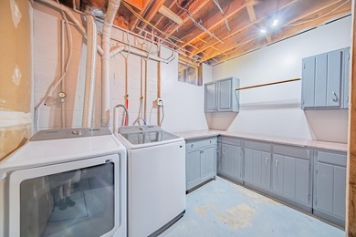 Nestled on over two acres in peaceful Grass Lake, this - photo 43