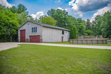 Nestled on over two acres in peaceful Grass Lake, this - photo 48