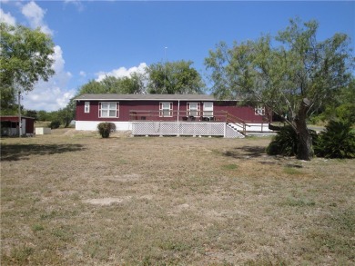 Lake Home For Sale in Sandia, Texas