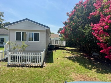 Great Mobile home on OWNED Lot at the end of Serenity Lane. Own