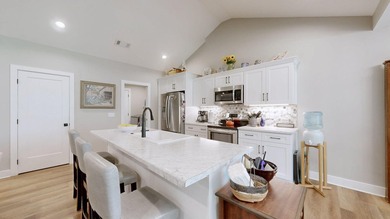 Waterfront living at an accessible price in this nearly new home - photo 12