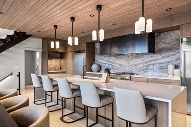 Indulge in exceptional lakefront living with 75 feet of private - photo 7