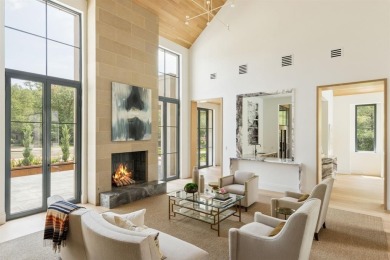 Set on almost an acre, this one-of-a-kind new construction