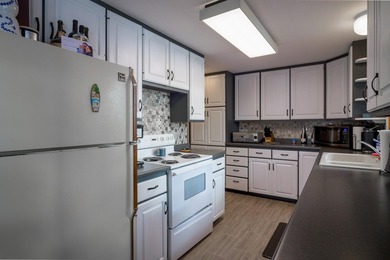 Highly sought-after Tomahawk Lake property featuring a 4BR, 2BA - photo 12