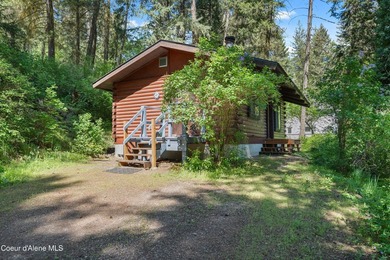 Nestled along the scenic Spokane River in Coeur d'Alene, this - photo 3