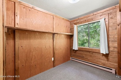 Nestled along the scenic Spokane River in Coeur d'Alene, this - photo 9