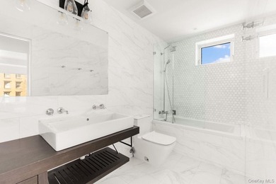 Welcome home to 140 Clinton Avenue, a meticulously maintained - photo 11