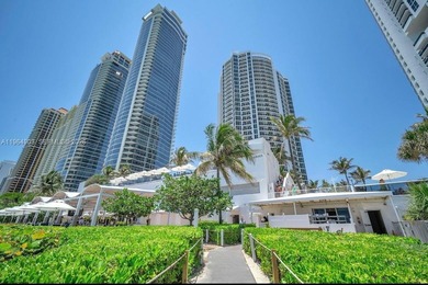 Turnkey condo-hotel unit at Trump International Beach Resort in