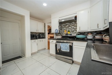 Welcome to this spacious and beautifully updated home nestled on - photo 11