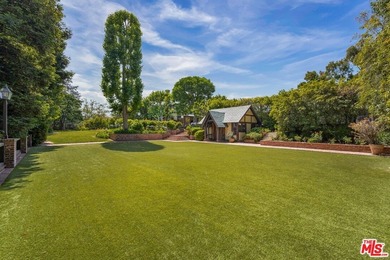 Located on one of the most desirable streets in all of Los - photo 11