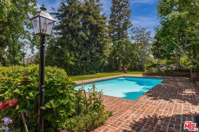 Located on one of the most desirable streets in all of Los - photo 12