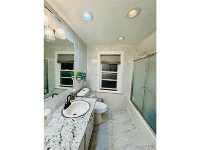 Welcome to this spacious and beautifully updated home nestled on - photo 22