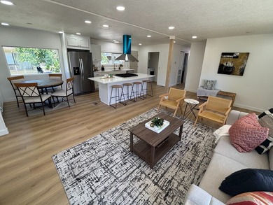 Completely remodeled and move-in ready! This rare 4-bedroom - photo 1