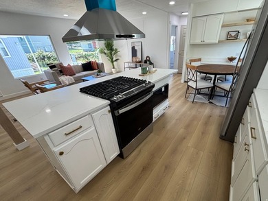 Completely remodeled and move-in ready! This rare 4-bedroom - photo 4