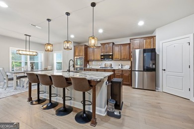 Welcome to 122 Brooks Landing, an exceptional 5-bedroom, 5 - photo 21