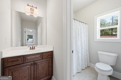 Welcome to 122 Brooks Landing, an exceptional 5-bedroom, 5 - photo 31