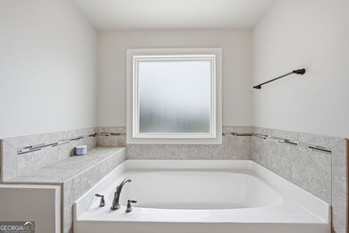 Welcome to 122 Brooks Landing, an exceptional 5-bedroom, 5 - photo 45