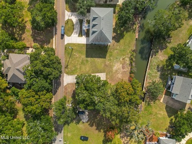 Picture a beautiful waterfront lot on a tranquil bayou, walking - photo 9