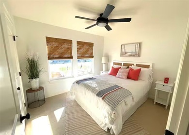 Step into island-style living with this charming - photo 9