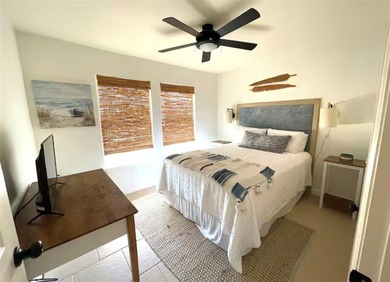 Step into island-style living with this charming - photo 10