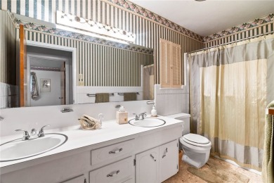 This home features a double lot and an oversized garage so you