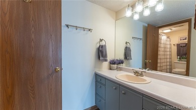 Wake up to open main channel views in the heart of Osage Beach - - photo 11