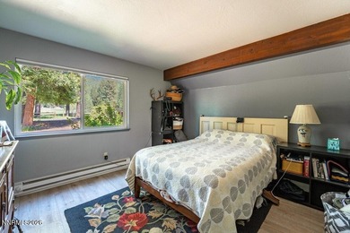 Just steps from the shores of Lake Tahoe, this rustic A-frame - photo 11