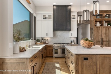Completely reimagined in 2024, this iconic Teton Valley home has - photo 11