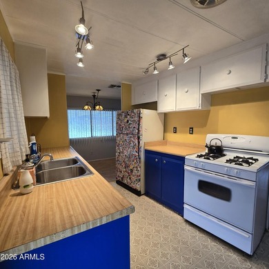 ON LEASED LAND: Step inside to an open large front room opens to - photo 23