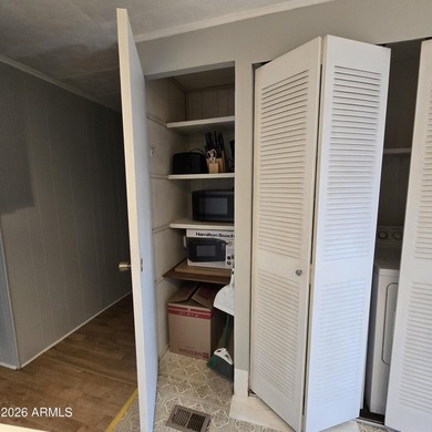 ON LEASED LAND: Step inside to an open large front room opens to - photo 25