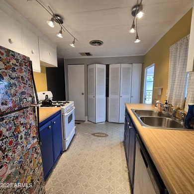 ON LEASED LAND: Step inside to an open large front room opens to - photo 26