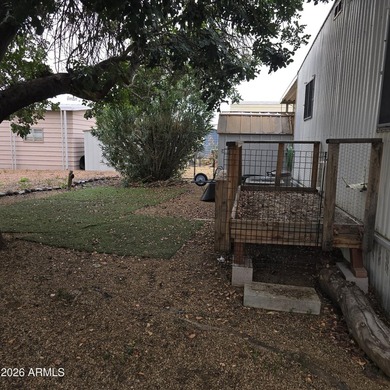 ON LEASED LAND: Step inside to an open large front room opens to - photo 29