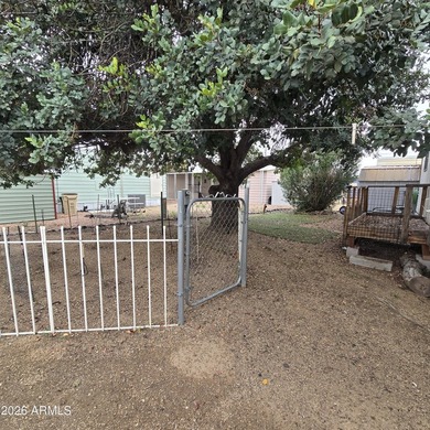 ON LEASED LAND: Step inside to an open large front room opens to - photo 30
