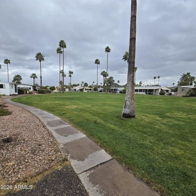 ON LEASED LAND: Step inside to an open large front room opens to - photo 40
