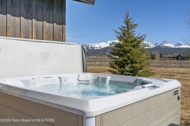 Completely reimagined in 2024, this iconic Teton Valley home has - photo 40