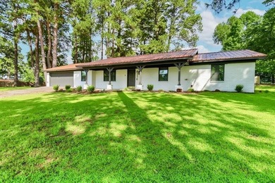 Situated on one of the neighborhood's elevated homesites, this - photo 1
