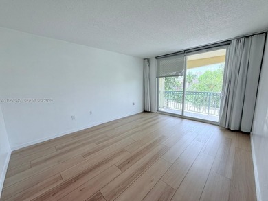 Spacious and well-maintained 2-bedroom, 2-bath condo in one of