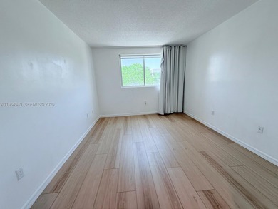 Spacious and well-maintained 2-bedroom, 2-bath condo in one of