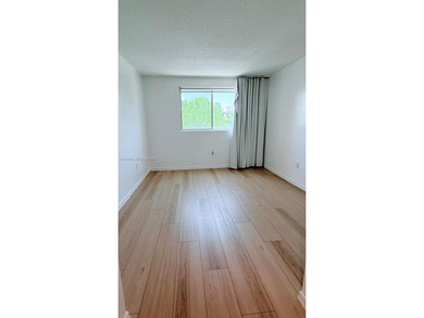 Spacious and well-maintained 2-bedroom, 2-bath condo in one of