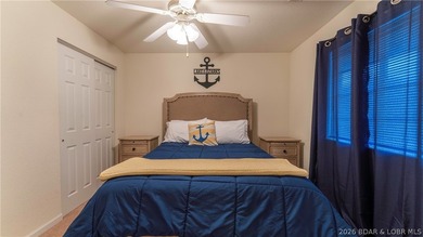 Wake up to peaceful cove views from your screened deck at this - photo 17