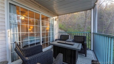 Wake up to peaceful cove views from your screened deck at this - photo 20