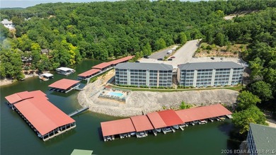 Wake up to peaceful cove views from your screened deck at this - photo 23